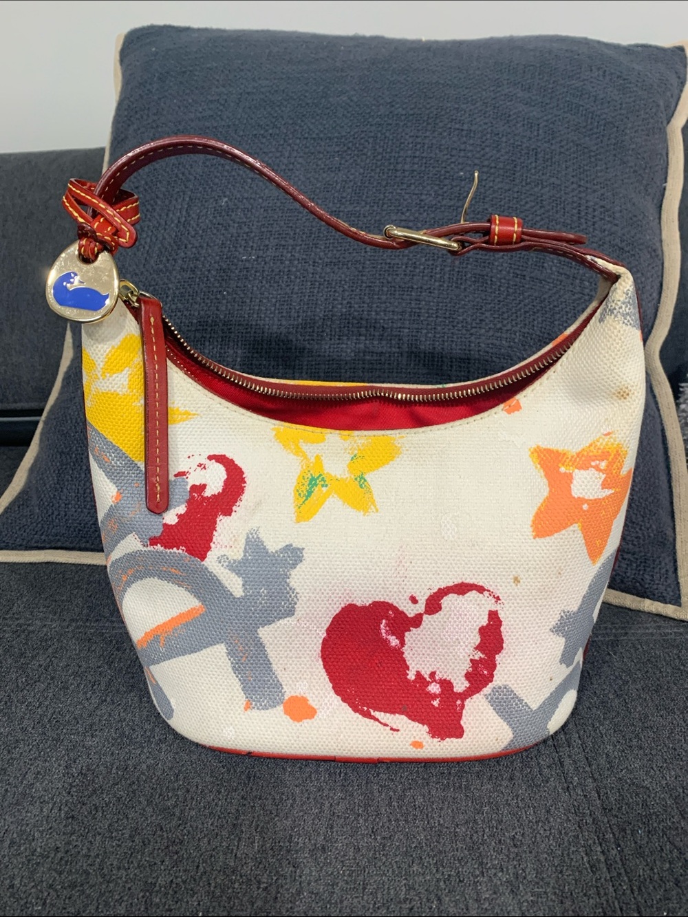 Dooney & Bourke White Canvas Hobo with Red Trim and Multicolor Print